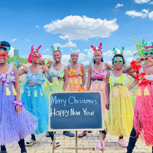 Merry Christmas From  African Colourful Hula Skirt Girls